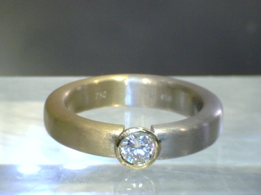 LUXORA bicolor Ring mit Brillant 0,23 ct. 750 Gold und 950 Platin # 53