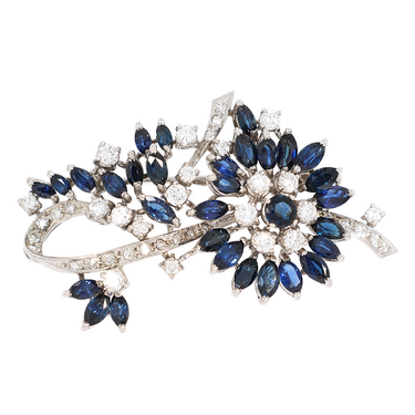 Brosche mit 19 Brillanten ca. 1,47 ct., 22 Diamanten ca. 0,22 ct. und 31 Saphire ca. 5,28 ct. aus 750 Weigold