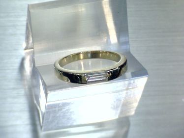 Ring mit Diamantbaguette ca. 0,40 ct. 750 Gelbgold # 57