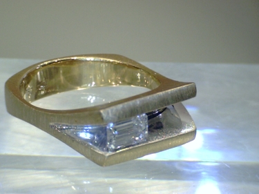 Ring mit Diamant im Smaragd Schliff ca. 0,40 ct. aus 750 Gelbgold / Weißgold # 53