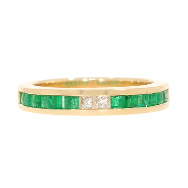 Ring mit 12 Smaragde ca. 0,67 ct. und 2 Princessdiamanten ca. 0,13 ct. aus 750 Gelbgold # 53