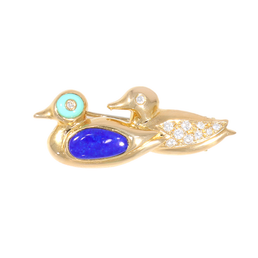 Brosche mit 11 Brillanten ca. 0,11 ct., 1 Lapis Lazuli und 1 Trkis aus 750 Gelbgold