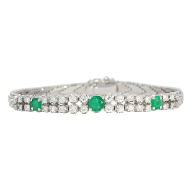Armband mit 32 Brillanten ca. 1,16 ct. und 3 Smaragde ca. 0,95 ct. aus 750 Weißgold 18,5 cm