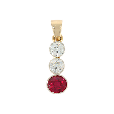 Bicolor Anhänger mit 2 Diamanten im Übergansschliff ca. 0,60 ct. und 1 Rubin ca. 0,70 ct. aus 585 Gelbgold / 850 Platin 2 Steine beschädigt