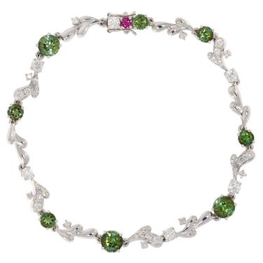 GÜBELIN Armband mit 45 Brillanten 1,18 ct. und 8 grüne Turmaline 3,10 ct. aus 750 Weißgold 18,5 cm